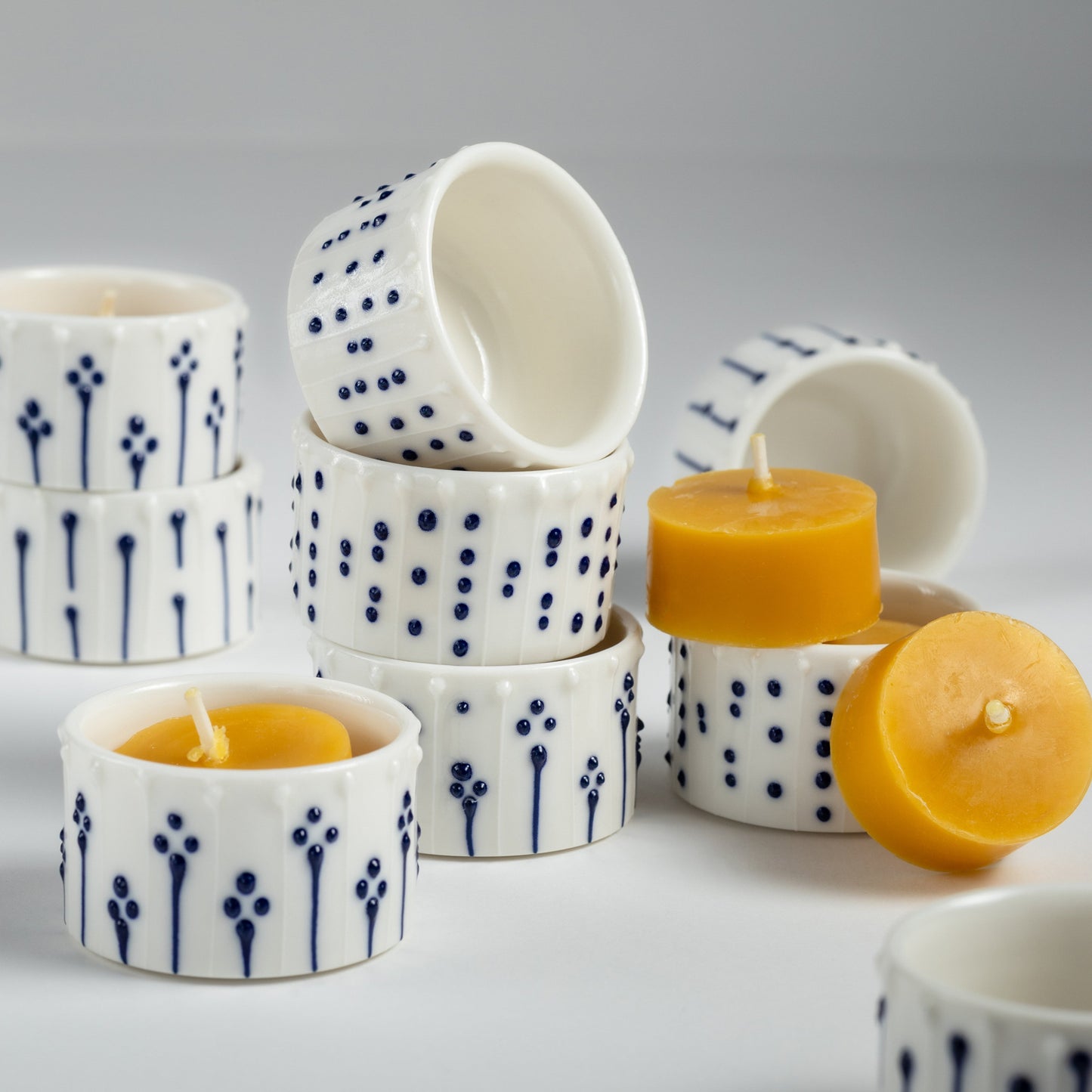 Beeswax tealight refills in handmade porcelain tealight holders