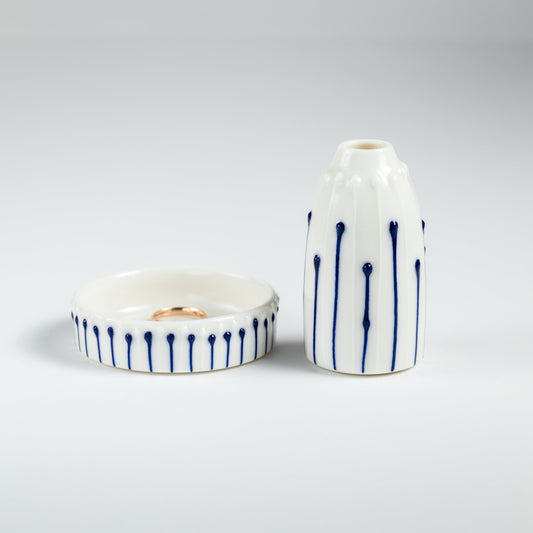 Handmade porcelain mini vase and ring dish gift set with blue slip-trailed line decoration.