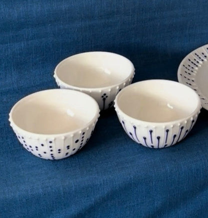 Handmade porcelain mini bowls with blue slip-trailed decoration 